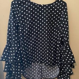$10 dotted black and white top, no brand.